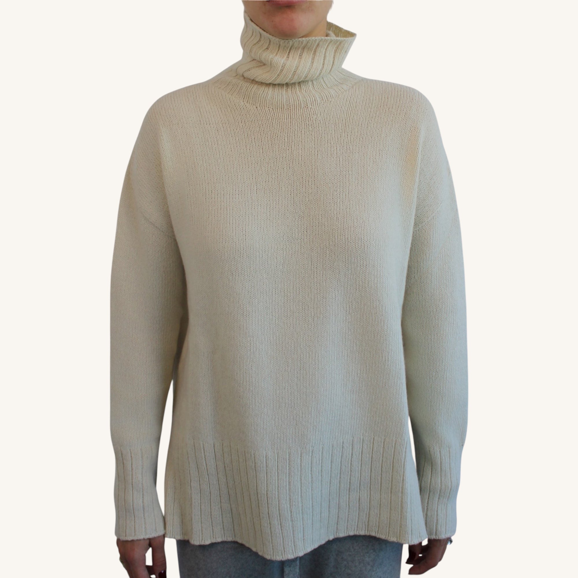 Cashmere turtleneck sweater with side slits