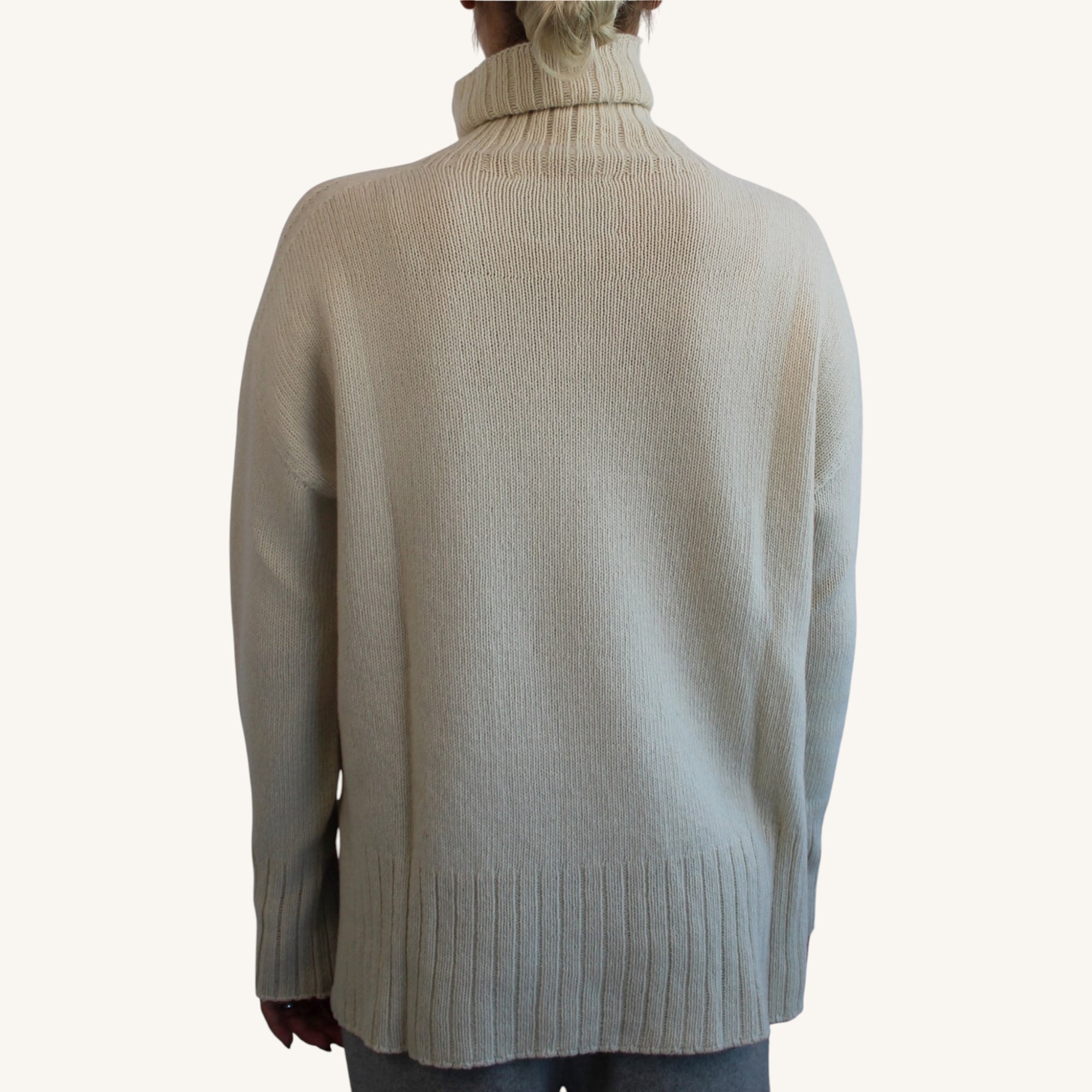 Cashmere turtleneck sweater with side slits