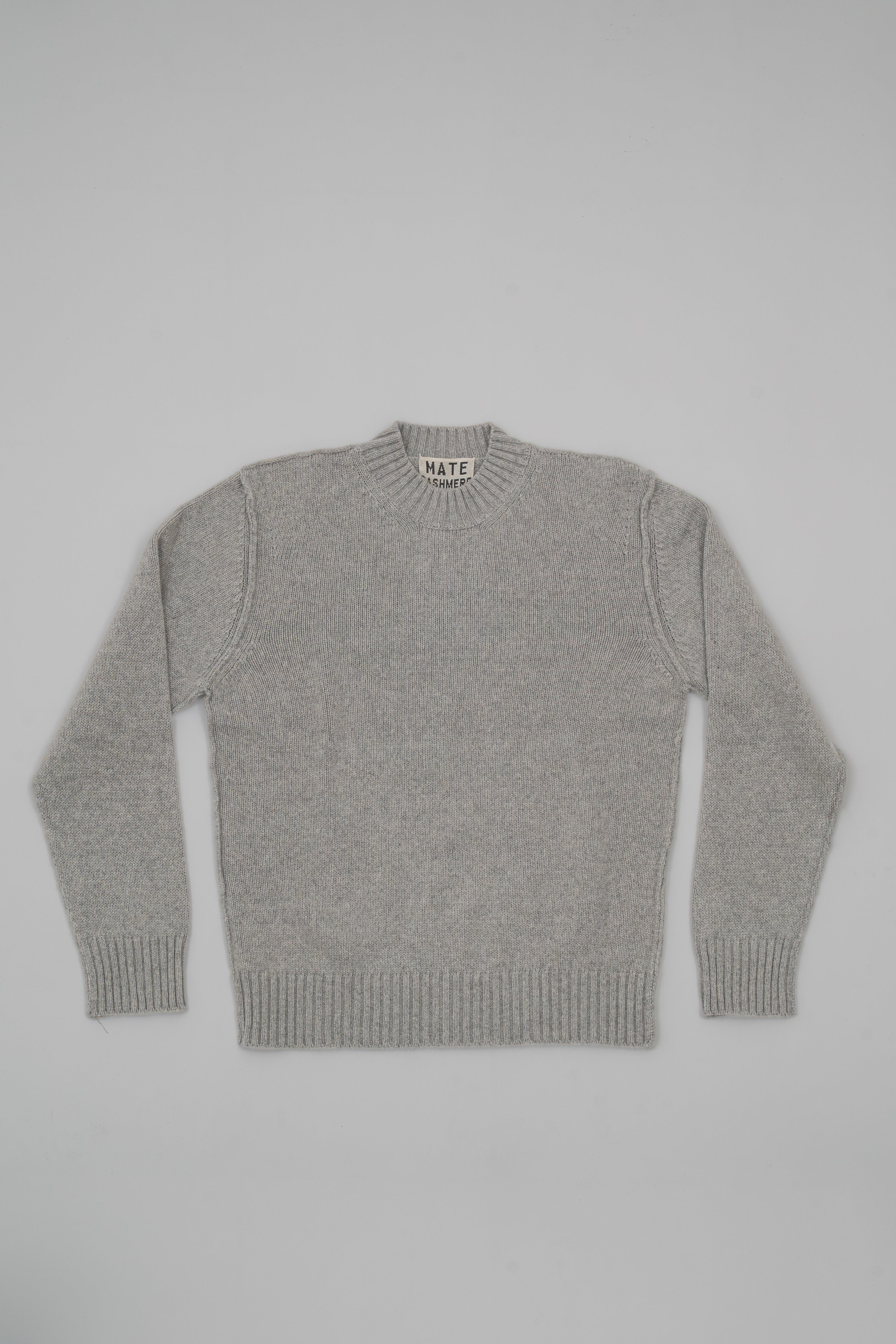 Cashmere sweater with exposed stitching