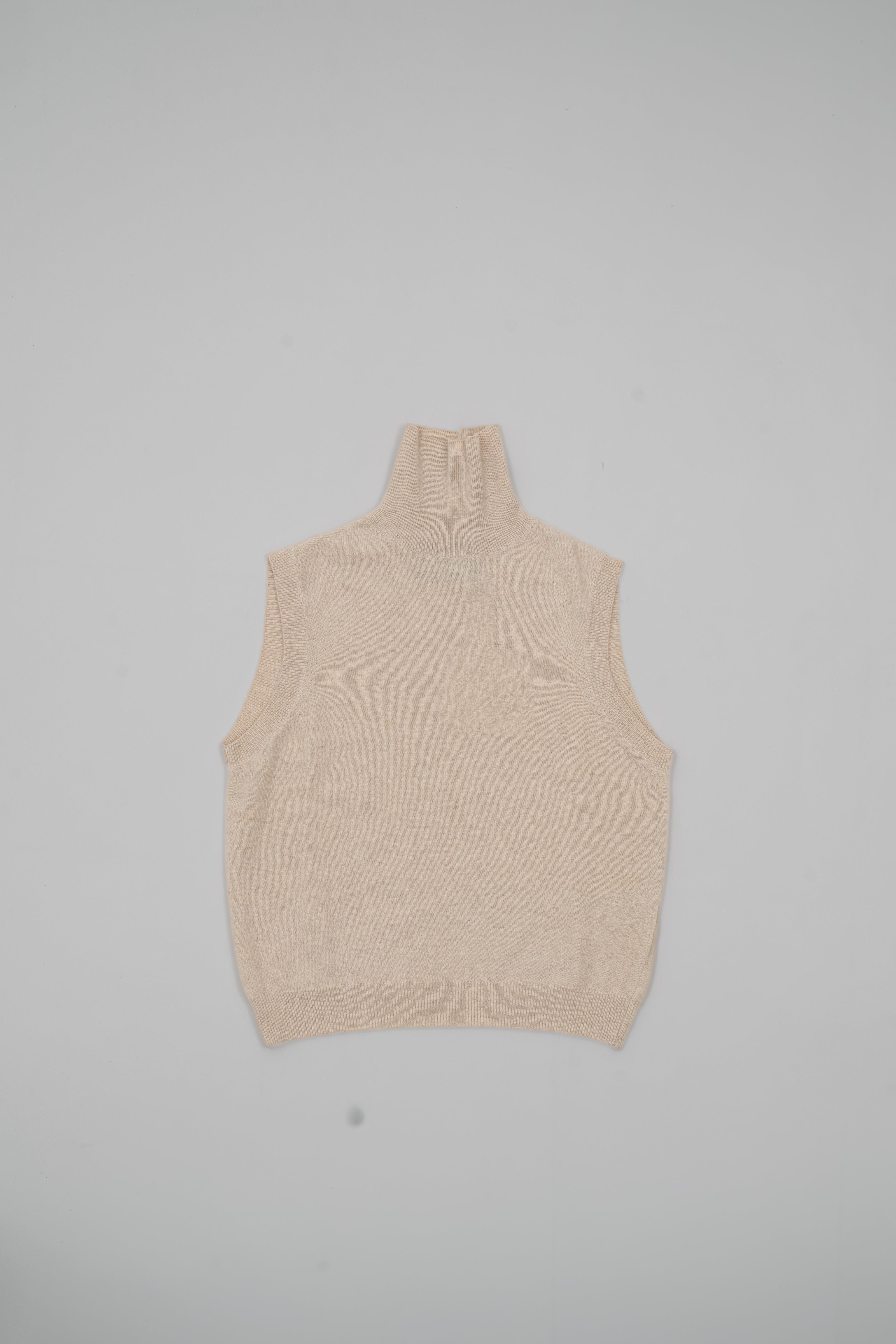 Sleeveless mock neck