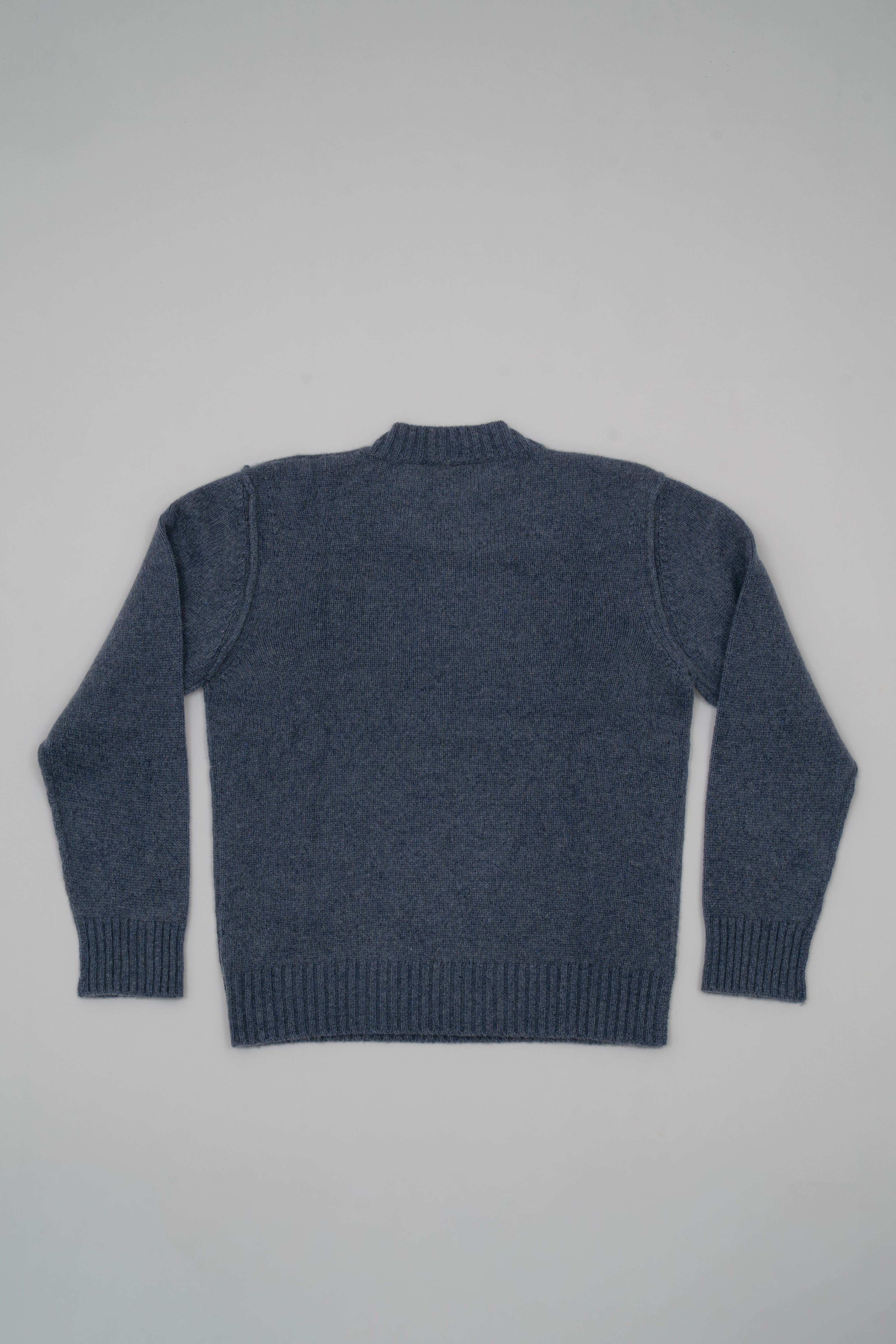 Cashmere sweater with exposed stitching